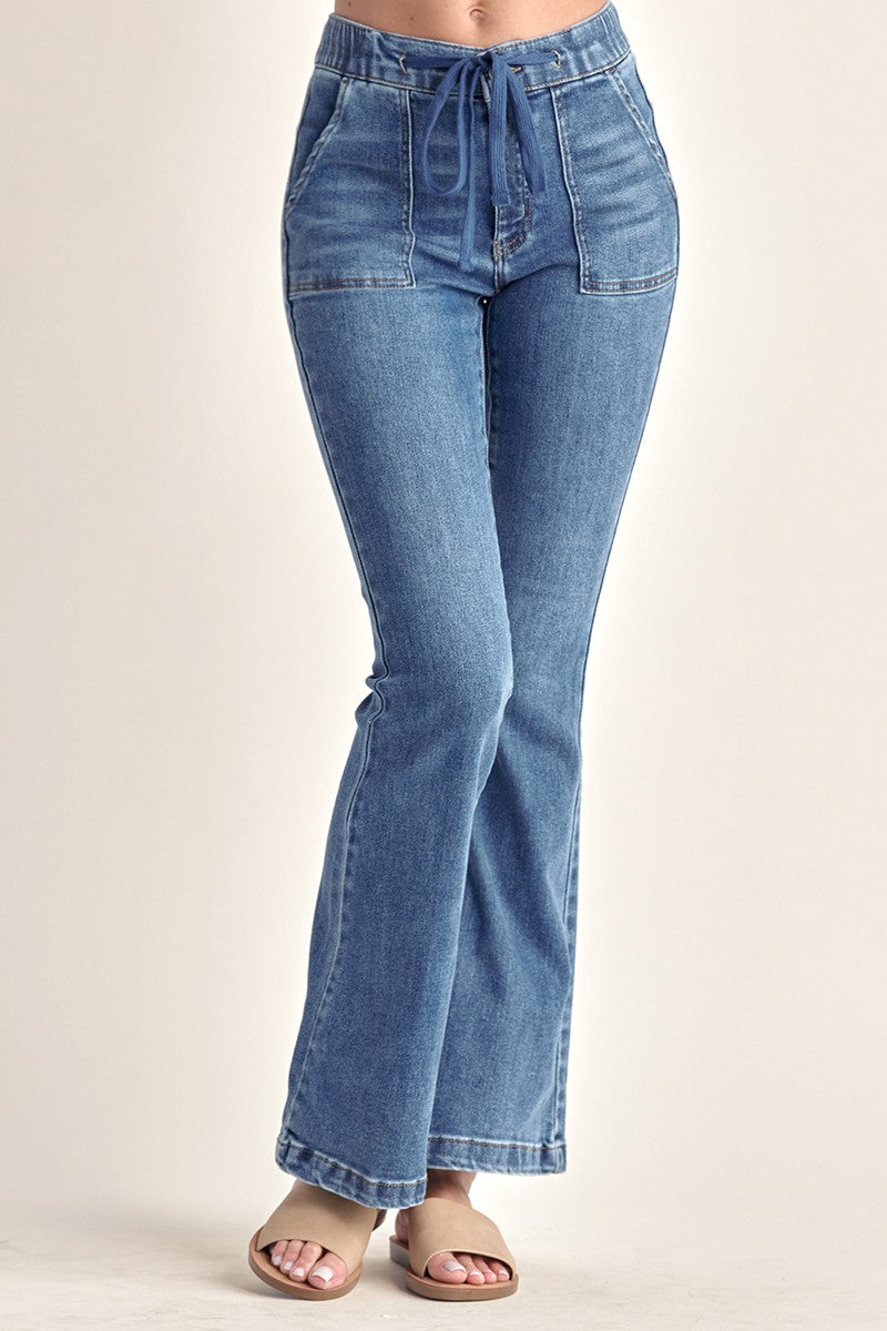 Flared mid hot sale rise jeans